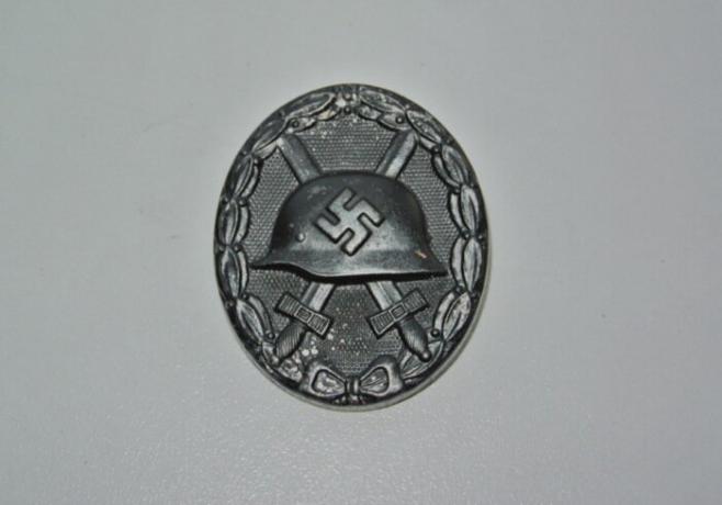 Rozet Nazi Almanya'sının üçüncü derece yara. İkinci derece - gümüş. İlk - altın. / Fotoğraf: forum.guns.ru. 